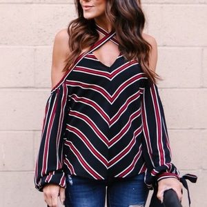 Vici stripped off the shoulder top!